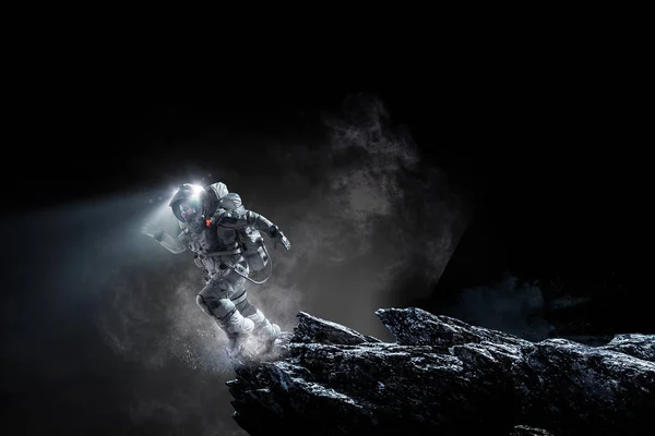 Spaceman running fast. Mixed media — Stock Photo, Image