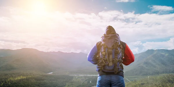 Hiker man in mountains. Mixed media — Stock Photo, Image