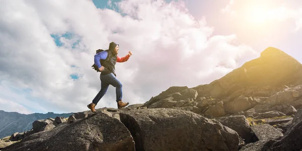 Hiker man in mountains. Mixed media — Stock Photo, Image