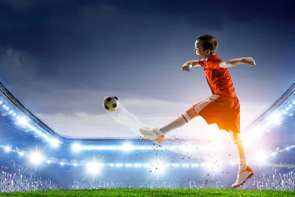 Little soccer champion. Mixed media — Stock Photo, Image