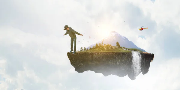 stock image Virtual reality experience, young man in VR glasses