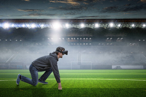 Young man in virtual reality. Mixed media