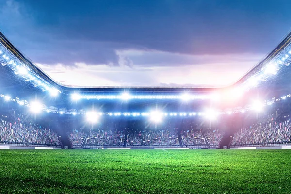 Arena de futebol noite inteira em luzes — Fotografia de Stock