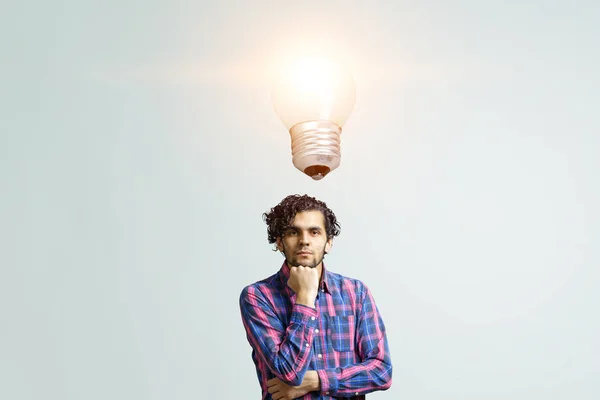 Man thinking and seeking new idea concept. Mixed media — Stock Photo, Image