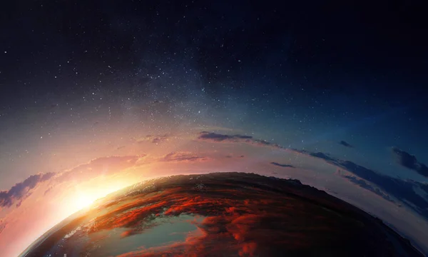 Earth with sunrise on blue space background — Stock Photo, Image