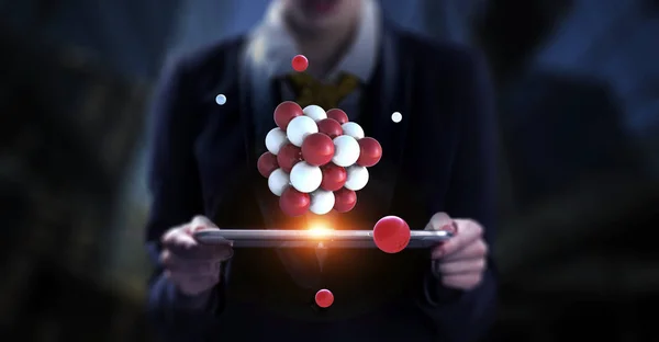 Businesswoman holding a tabalet with a bunch of spheres levitating above. Mixed media — Stock Photo, Image