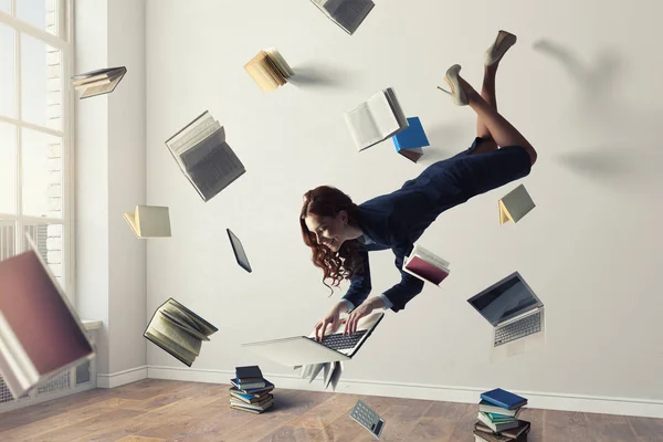 Joyful beautiful young levitating businesswoman. Mixed media — Stock Photo, Image