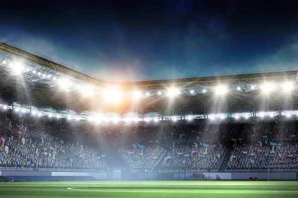 Arena de fútbol de noche completa en luces — Foto de Stock