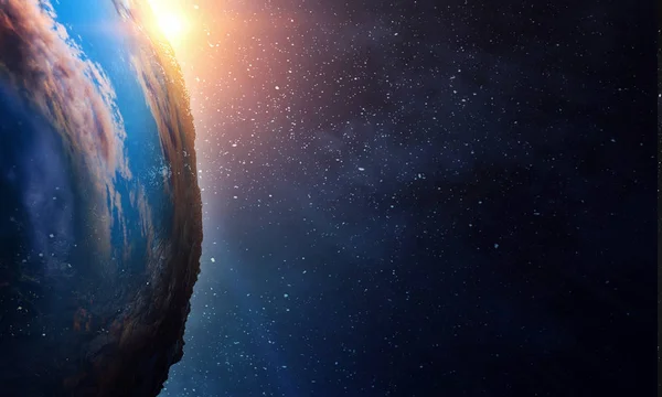 青い宇宙の背景に日の出を持つ地球 — ストック写真