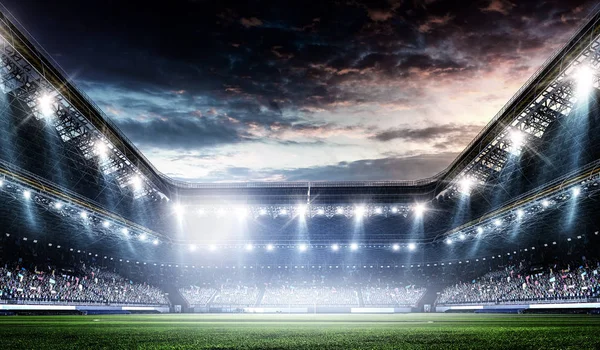 Işıklar altında tam gece futbol sahası — Stok fotoğraf