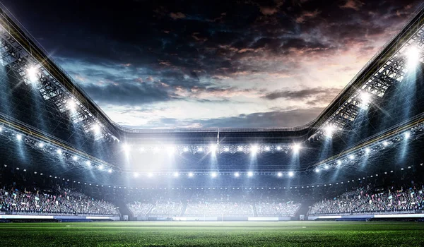 Arena de fútbol de noche completa en luces — Foto de Stock