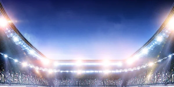 Arena de fútbol de noche completa en luces —  Fotos de Stock