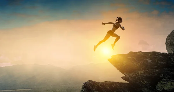 Jumping over precipice, challenge concept. — Stock Photo, Image