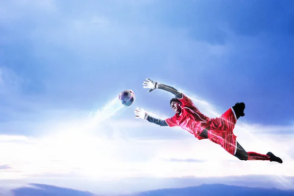 Soccer goalkeeper in action. Mixed media — Stock Photo, Image