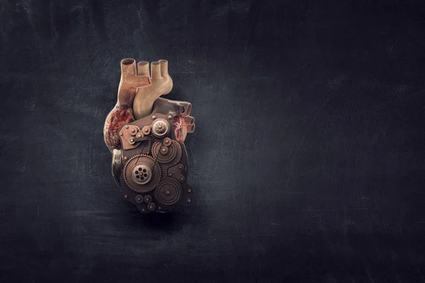 Анатомическое сердце, изготовленное из шестеренок и механических деталей — стоковое фото