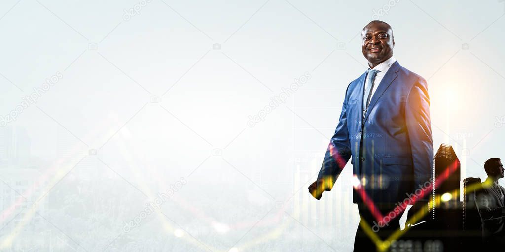 Black smiling businessman and white thoughtful businessman and a scyscraper