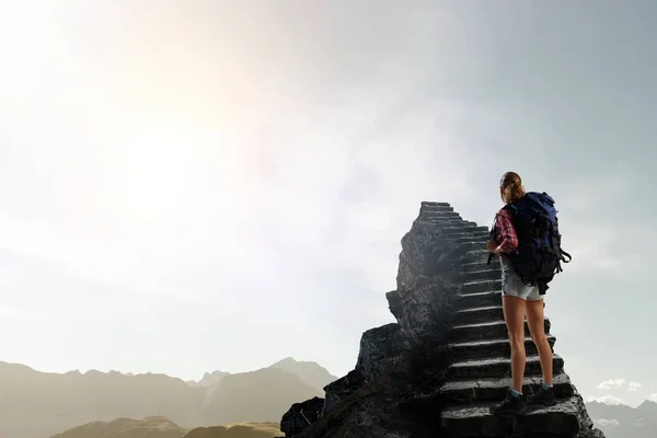 Travelling female tourist with backpack — Stock Photo, Image