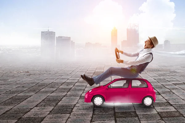 Happy travelling on toy vehicle — Stock Photo, Image