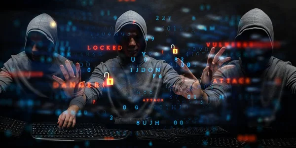 Hacker in felpa con cappuccio tema scuro — Foto Stock