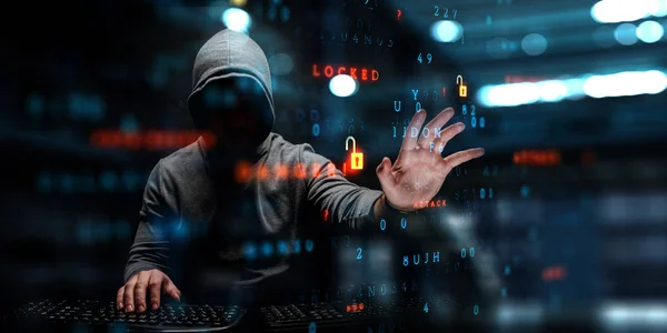 Hacker in hoodie donker thema — Stockfoto