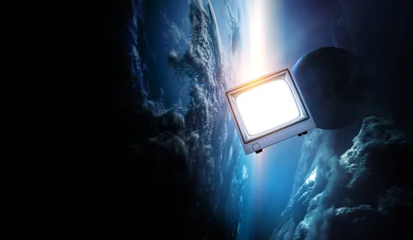 Retro TV flying in space — Stock Photo, Image