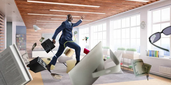 Hombre de negocios alegre saltando alto. Medios mixtos —  Fotos de Stock