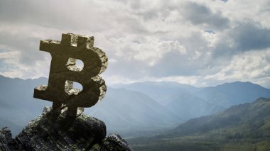 Dağ zirvesinde Bitcoin sembolü