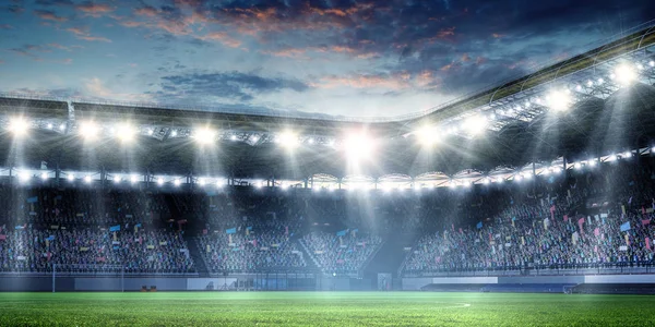 Arena de fútbol de noche completa en luces — Foto de Stock