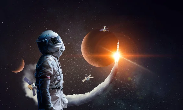 Homem do espaço e os planetas tema abstrato — Fotografia de Stock