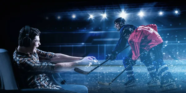Młody człowiek gra w hokeja na lodzie gry — Zdjęcie stockowe
