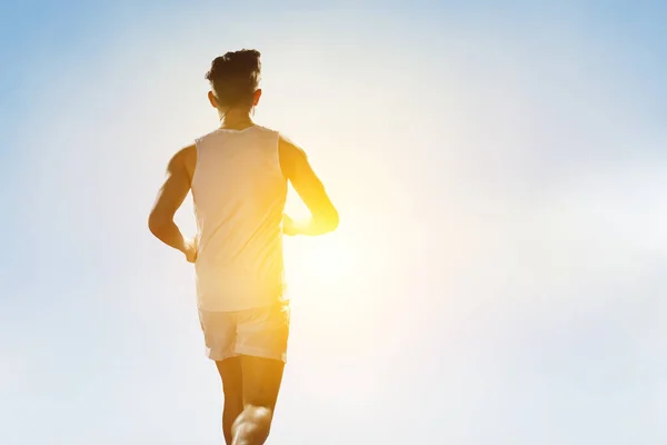 Jogging sportif jeune homme. Techniques mixtes . — Photo