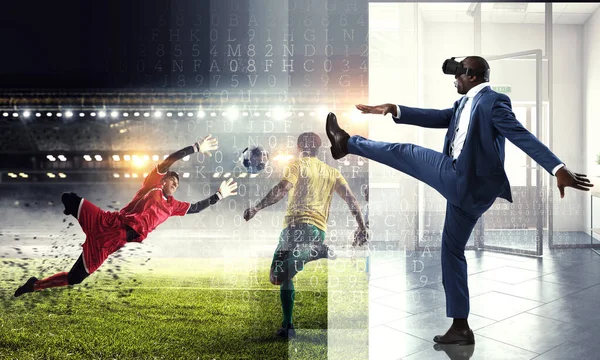 African man in virtual helmet . Mixed media — Stock Photo, Image