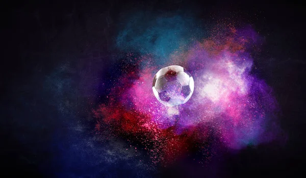 Pallone da calcio su sfondo scuro colorato — Foto Stock