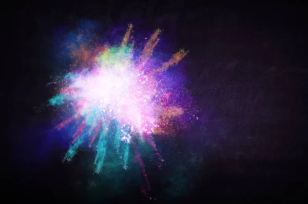 Explosion of colored powder . Mixed media — Stock Photo, Image