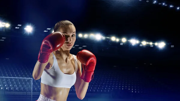 Young woman boxing. . Mixed media — Stock Photo, Image