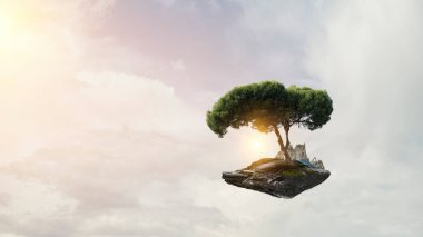 Ağaç ve manzaranın resmi
