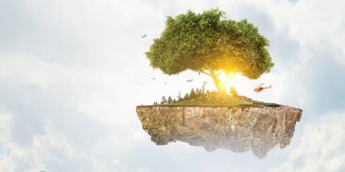 Ağaç ve manzaranın resmi
