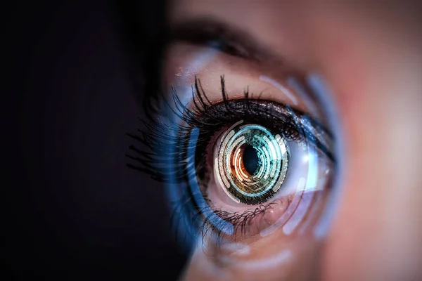 Close up of woman eye in process of scanning — Stock Photo, Image