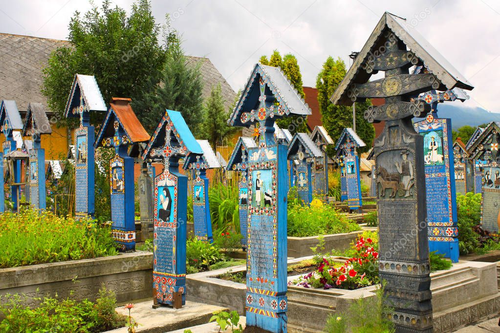 ROMANIA - 25 JULY, 2017: Painted wooden crosses in Merry Cemetery, Sapanta, Maramures 