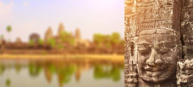 Dev taş yüzünde Prasat Bayon tapınağında arka plan bulanık. Ünlü Angkor Wat karmaşık, khmer kültür, Siem Reap, Kamboçya