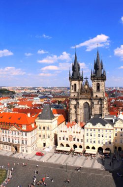 Famous Tyn Church on Old Town Square, Prague, Czech Republic. View from Tower with astronomical clock clipart