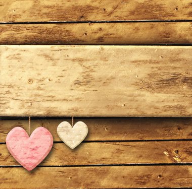 Şablon eski kurulları kahverengi renk ve iki ahşap kalp dokusu ile ilgili alay et. Metin için yer kopyalayın