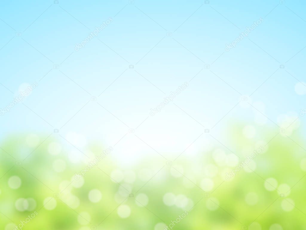 Abstract sunny blur spring background of green and blue colors