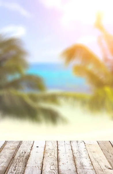 Wooden table top on blurred seascape background — Stock Photo, Image