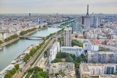Aerial view of 15th arrondissement of Paris with residential buildings, river Seine and Eiffel tower, France clipart
