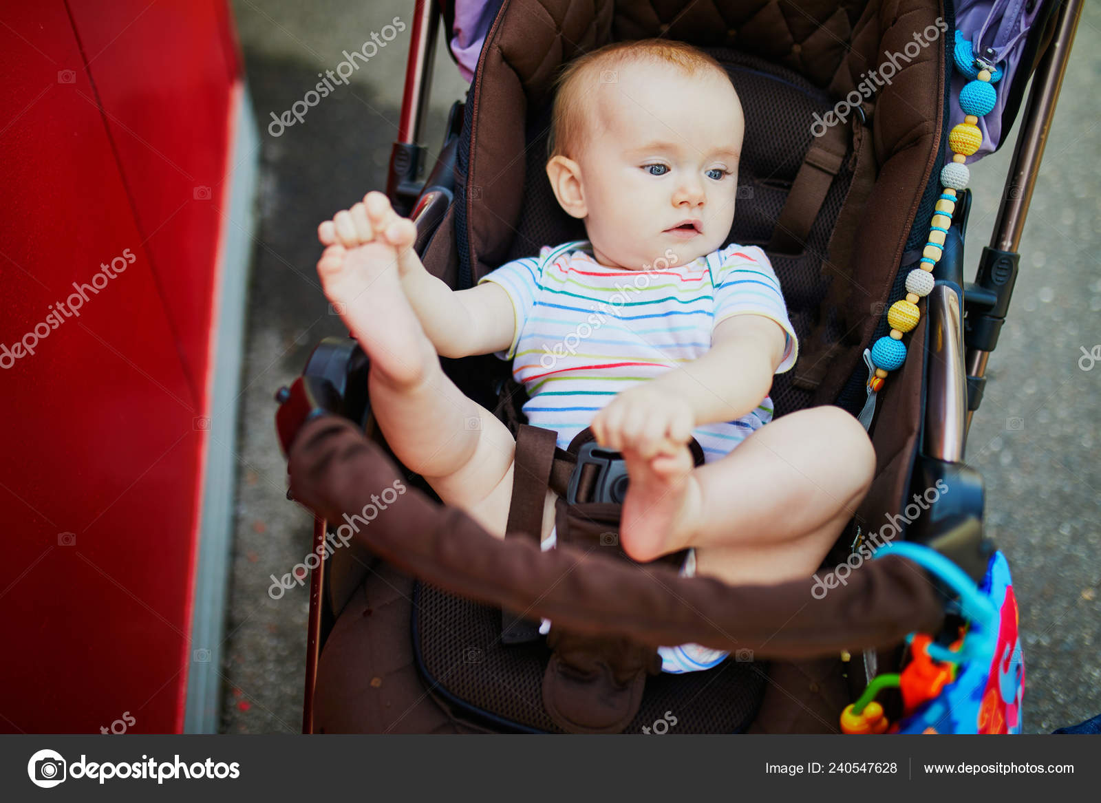 baby girl in stroller