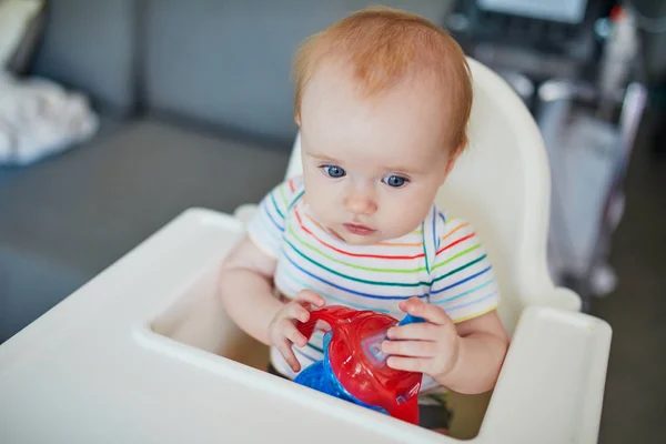 Little Baby Girl Sitting High Chair Home Restaurant Drinking Water — Stock Photo, Image