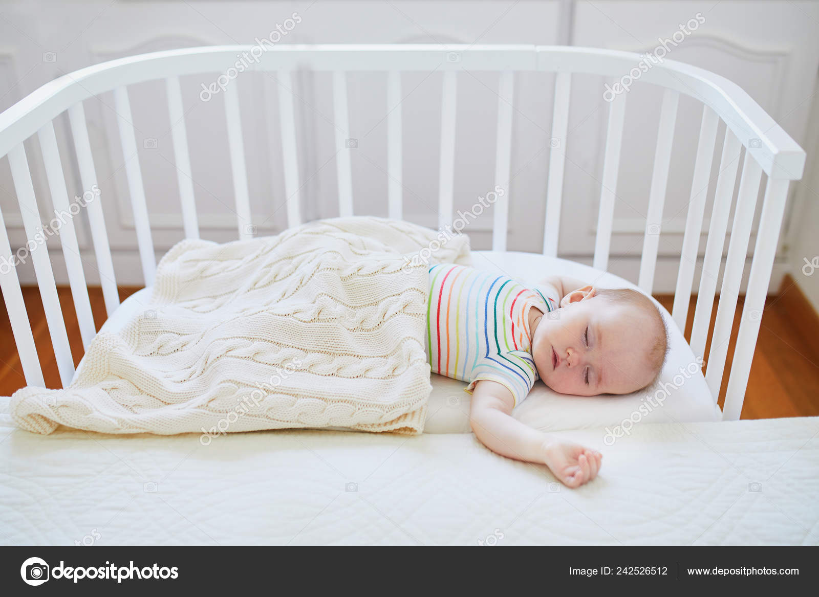 baby next to bed sleeper