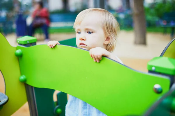Adorable toddler feeling sad on playground — Stock Photo, Image