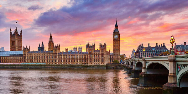 Cityscape of Big Ben and Westminster Bridge with river Thames at sunset, London, UK